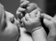 Barnhand bebis fingrar Foto David Gimlin